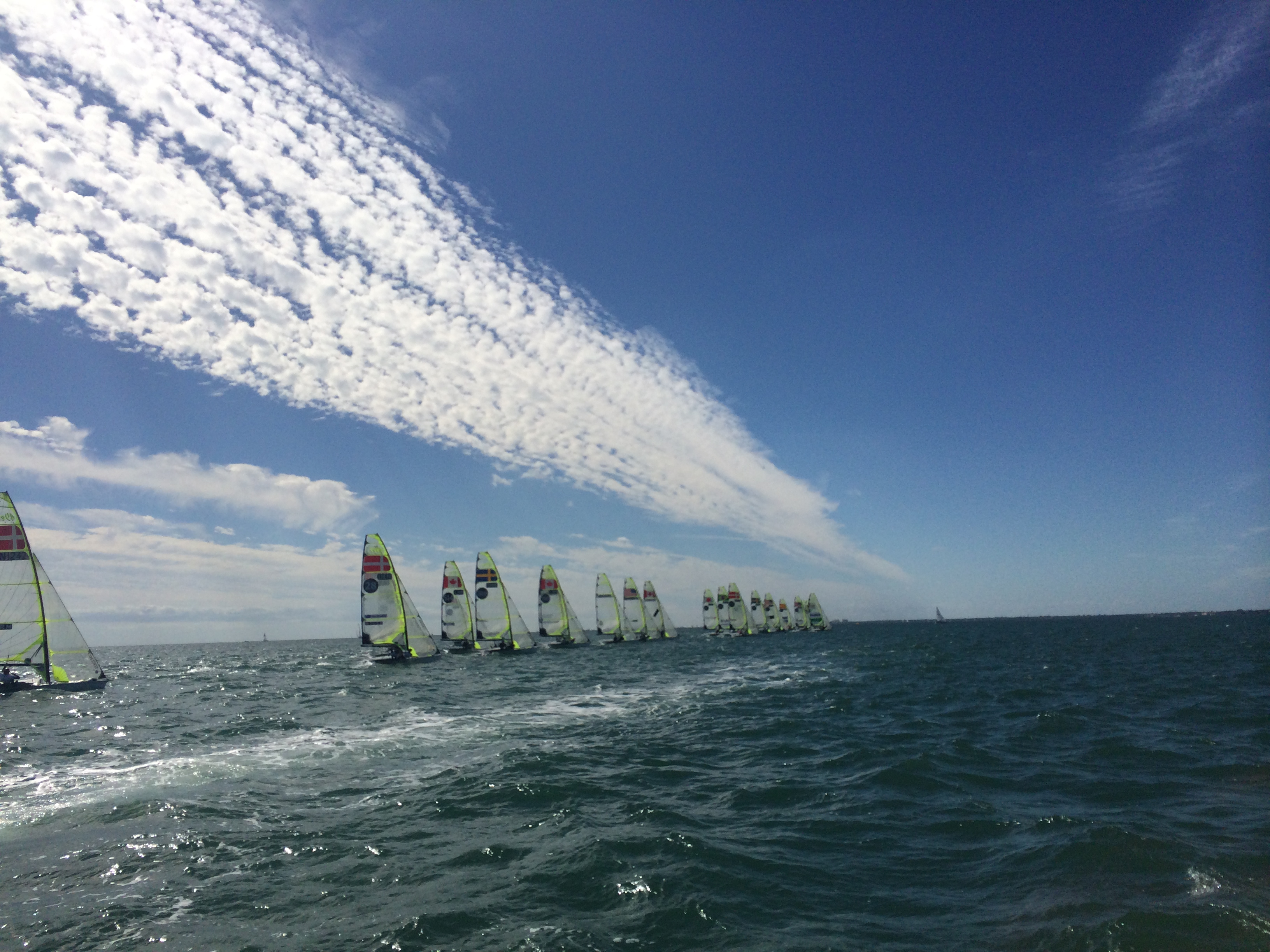 49er sailing under blue skies